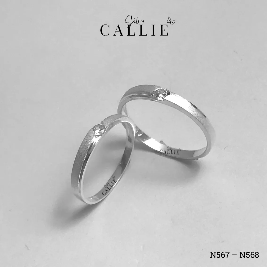 N567 - N568: Nhẫn đôi bạc Callie Silver 1 viên chủ đai cát hai bên